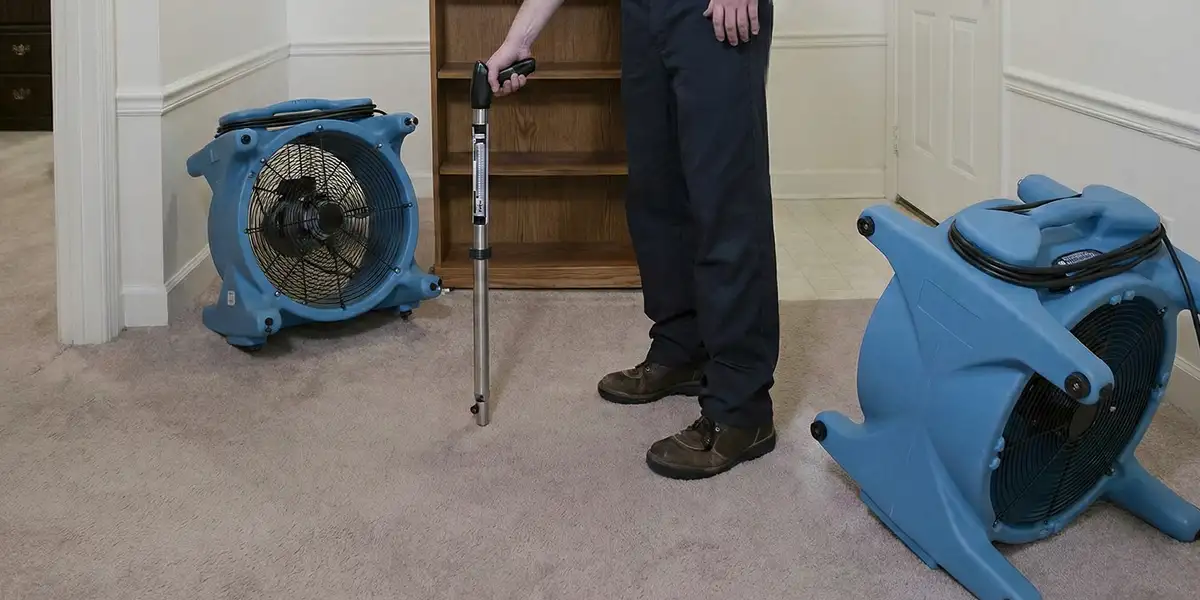 emergency water removal equipment deployed to dry a flooded residential interior in West Palm Beach, FL