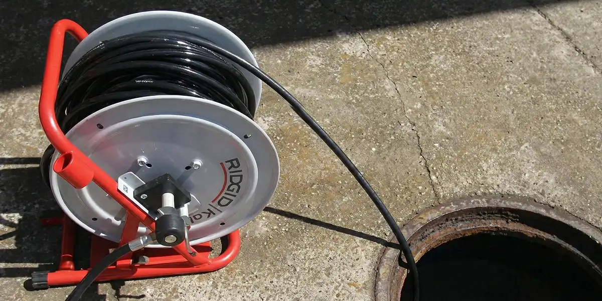 sewer rodding equipment prepared to clear clogged sewer lines in West Palm Beach, FL
