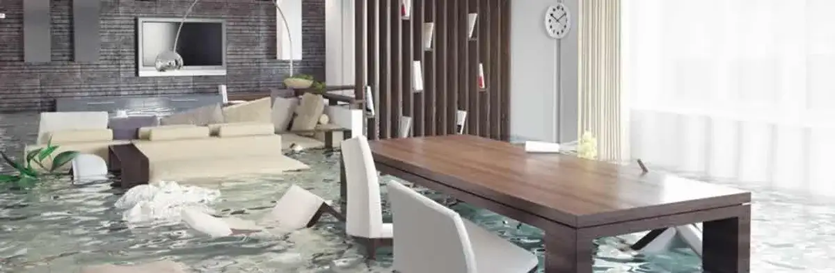 home interior affected by water damage with flooded floors and displaced furniture in West Palm Beach, FL